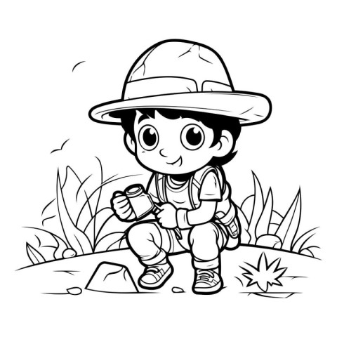 Cute little explorer boy in safari hat with binoculars