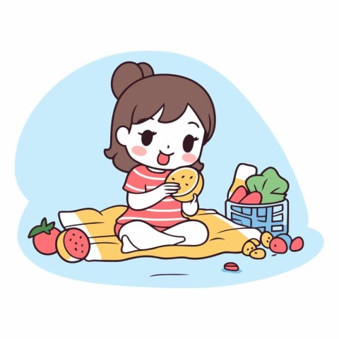 Girl eating a sandwich on the beach with a basket of fruits and