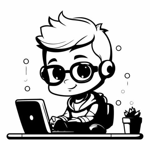 Cute boy with glasses using a laptop computer.