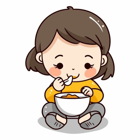 Cute little girl eating a bowl of cereal.