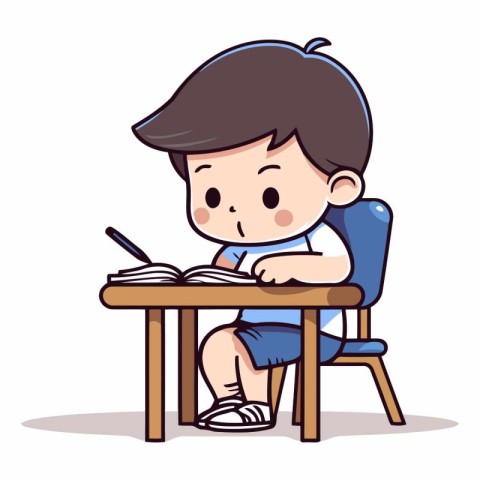 Boy sitting at the table and writing in notebook.