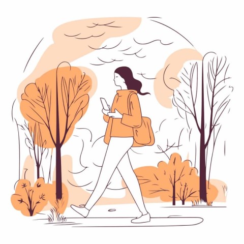 Young woman walking in autumn park and using smartphone.