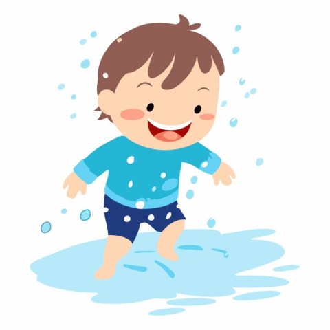 Cute little boy playing in a puddle of water.