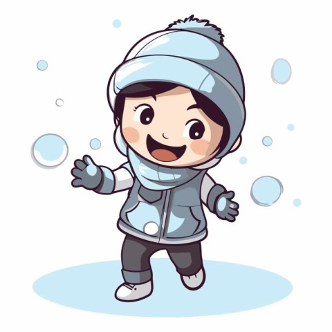 Cute little boy in winter clothes playing snowballs.