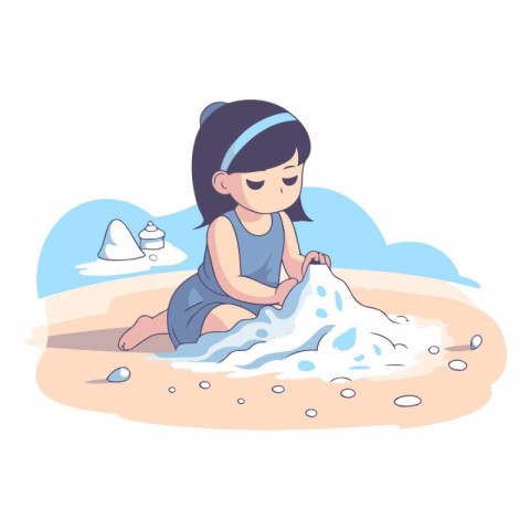 Cute little girl playing with sand on the beach