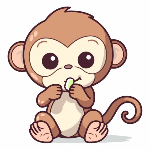 Monkey sitting and holding a candy in his hand