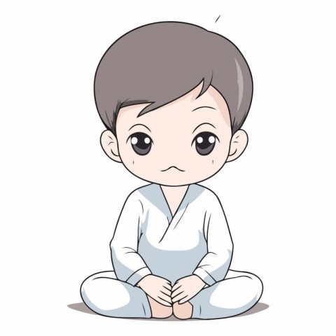 Cute little boy sitting in lotus position.