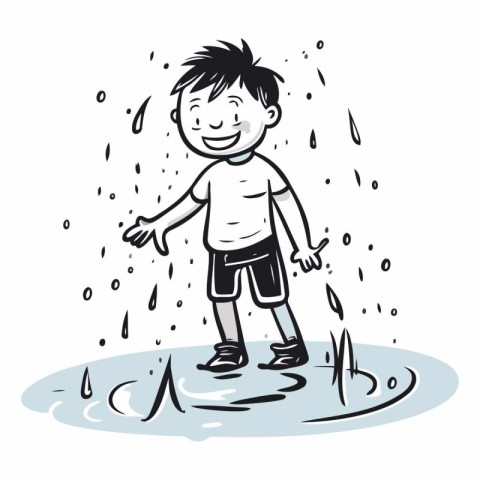 Little boy playing in a puddle of water.