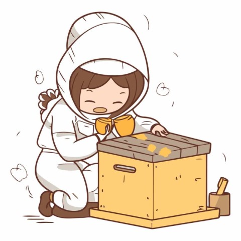 Little boy in beekeeper costume with a wooden box full of honey