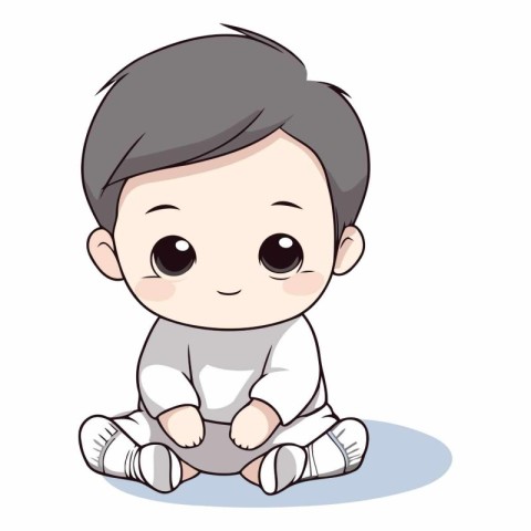 Cute little baby boy sitting on the floor.