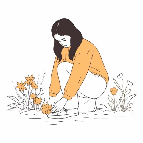 Sad woman sitting on the ground and looking at flowers.