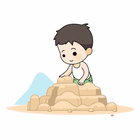 Little boy playing with sand in a sand castle.