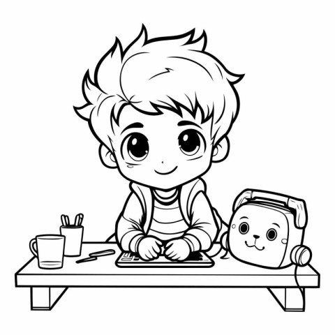 Cute little boy drawing with pencils on table.