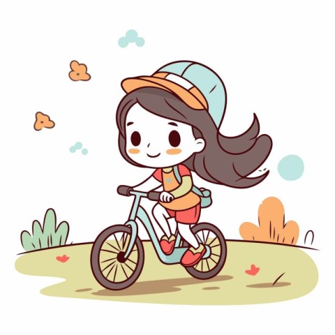 Cute little girl riding a bicycle in the park.