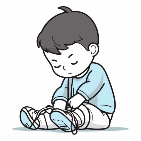 Little boy sit and tying shoelaces on sneakers.