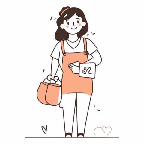 Young woman in apron holding a shopping bag.