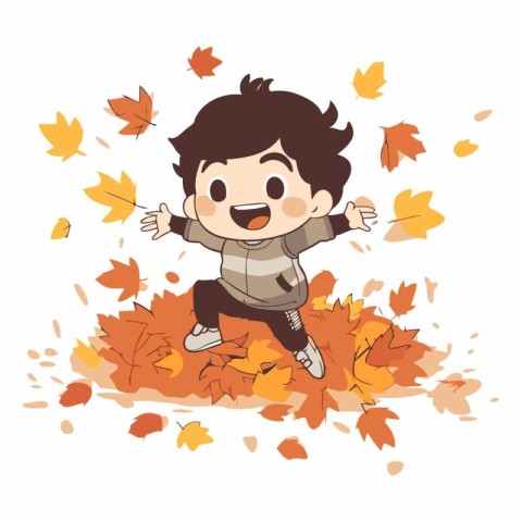 cute boy playing with autumn leaves in the park