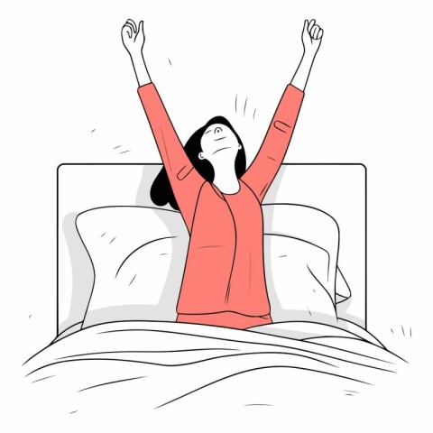 Happy young woman waking up in the morning in bed.