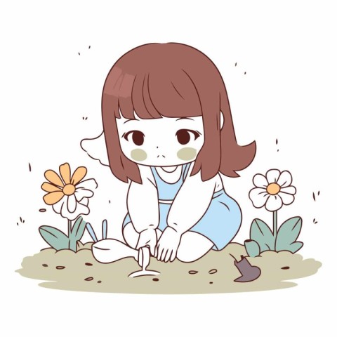 Cute little girl planting flowers in the garden.