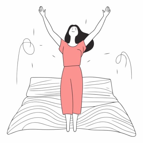 Happy woman waking up in the morning in bed.