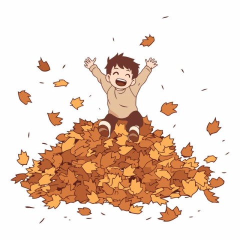 Happy boy sitting on a pile of autumn leaves.