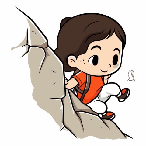 Little boy climbing a cliff of a child climbing a rock.