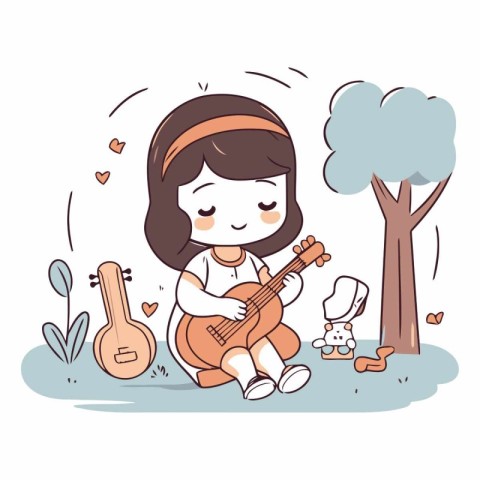 Cute little girl playing guitar in the park.