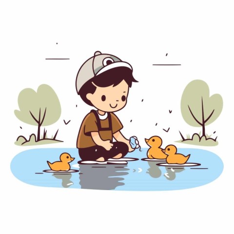 Boy playing with ducklings in a puddle.