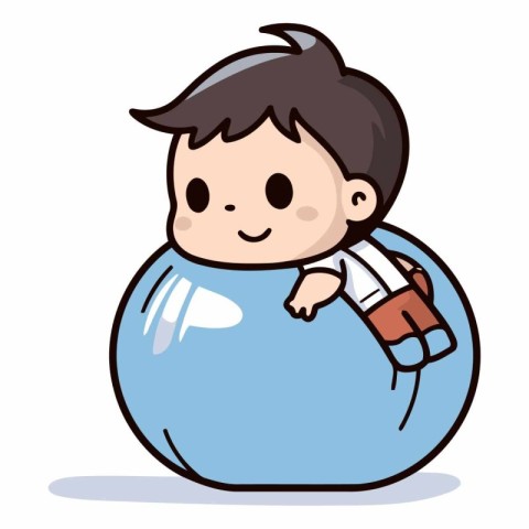 Cute little boy playing on a big ball.