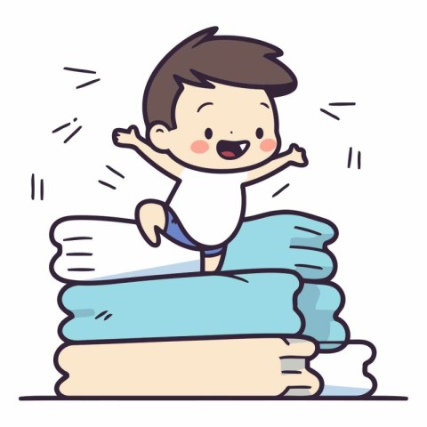 cute little boy on the stack of towels.