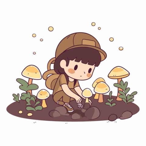 Cute little boy playing with mushrooms in the garden.