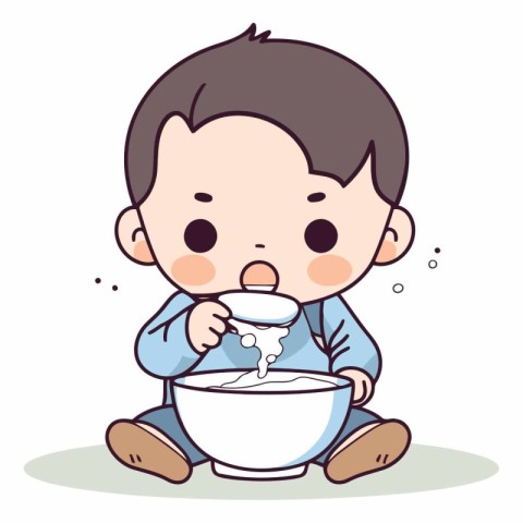 Cute little boy eating milk in a bowl.