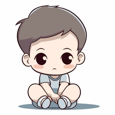 Cute little baby boy sitting on the floor.