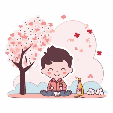 Cute boy drinking tea in cherry blossom garden