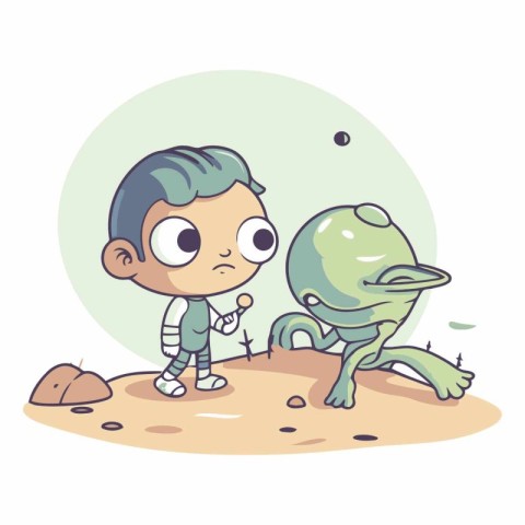 Cute little boy playing with alien on the sand.