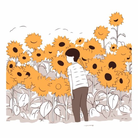 Young man standing in a field of sunflowers.