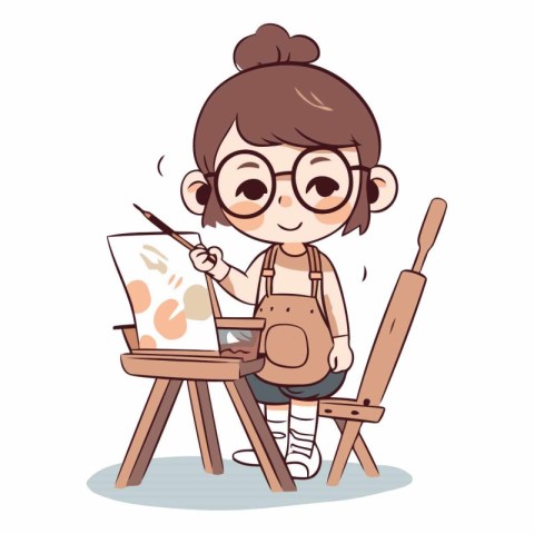 Girl painting on the easel with brush and palette