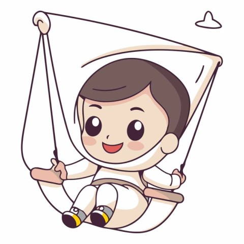 Cute little boy swinging on a hammock.