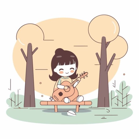 Cute little girl playing guitar in the park.