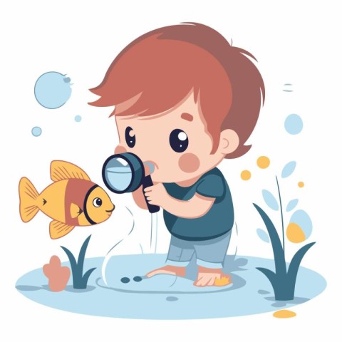 Cute little boy looking through a magnifying glass on a fish