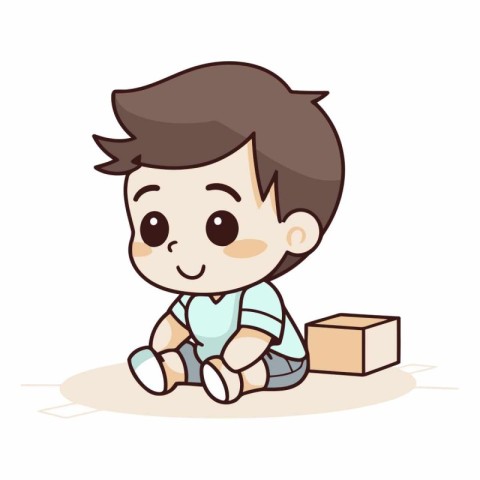 Cute little boy sitting and playing with cardboard box.