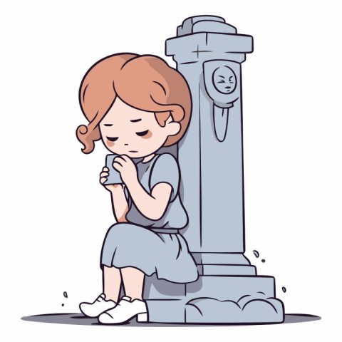 Sad little girl sitting on a grave and crying.