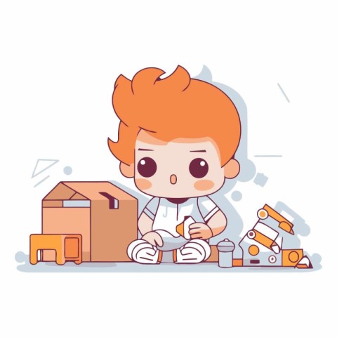 Cute little red-haired boy playing with toys.