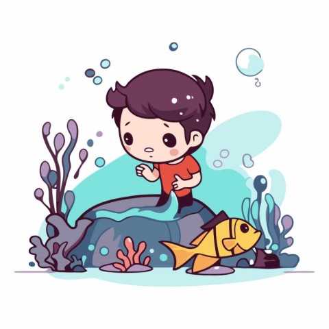 Cute little boy swimming in the sea with fish