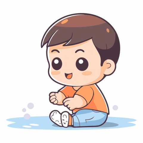 Cute little boy sitting and playing with soap bubbles.