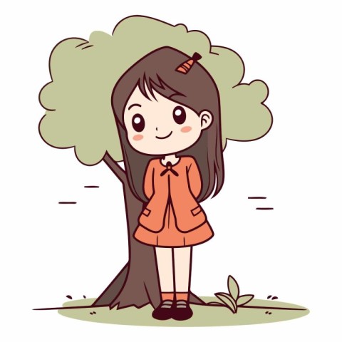 Cute little girl standing near a tree and smiling.