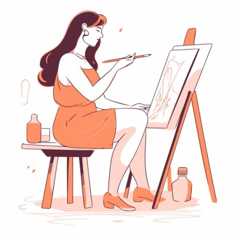 Young woman draws a picture on the easel.