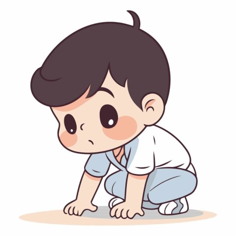 Cute little boy kneeling and looking at something.