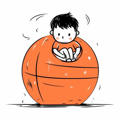 Cute little boy sitting on a big orange ball.