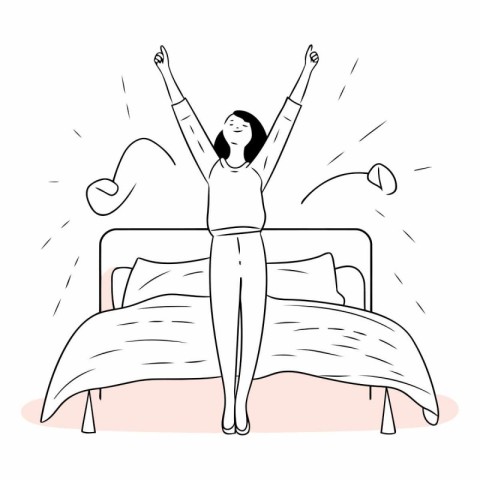 Happy woman waking up in the morning of a young woman in bed.